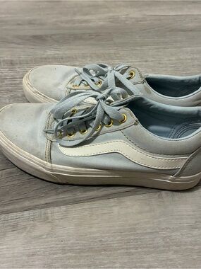 blue low top vans sneakers